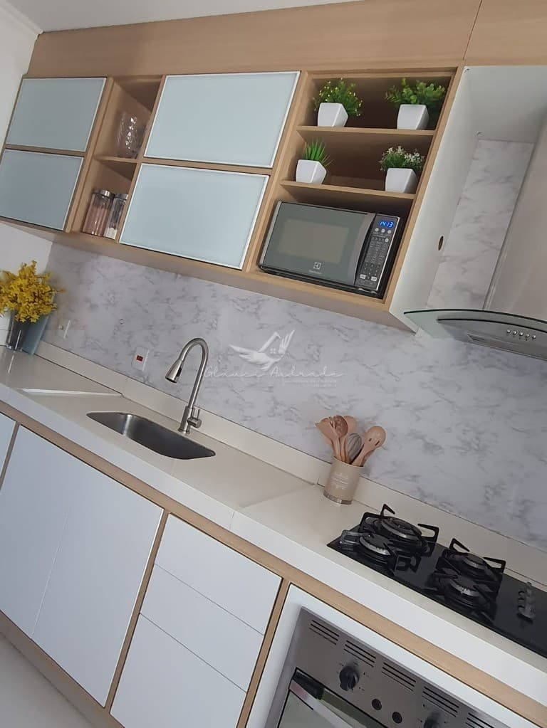 Venha conhecer o seu novo lar! Lindo apartamento com 2 quartos, 2 salas, 1 banheiro, 1 vaga de garag - foto 6